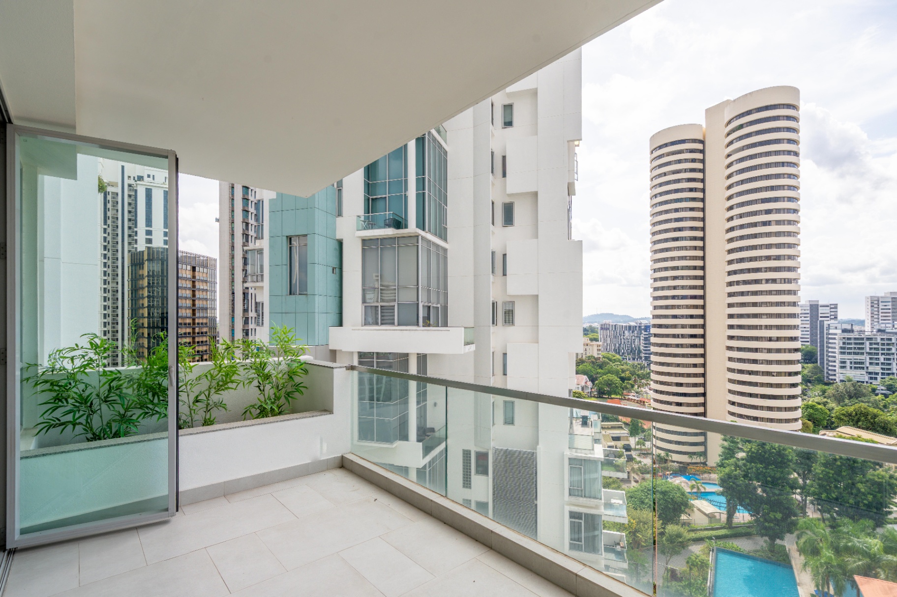 Draycott 8 — balcony framing iconic twin-tower architecture across Ardmore