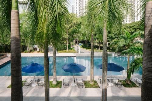 Palm-lined pool grounds