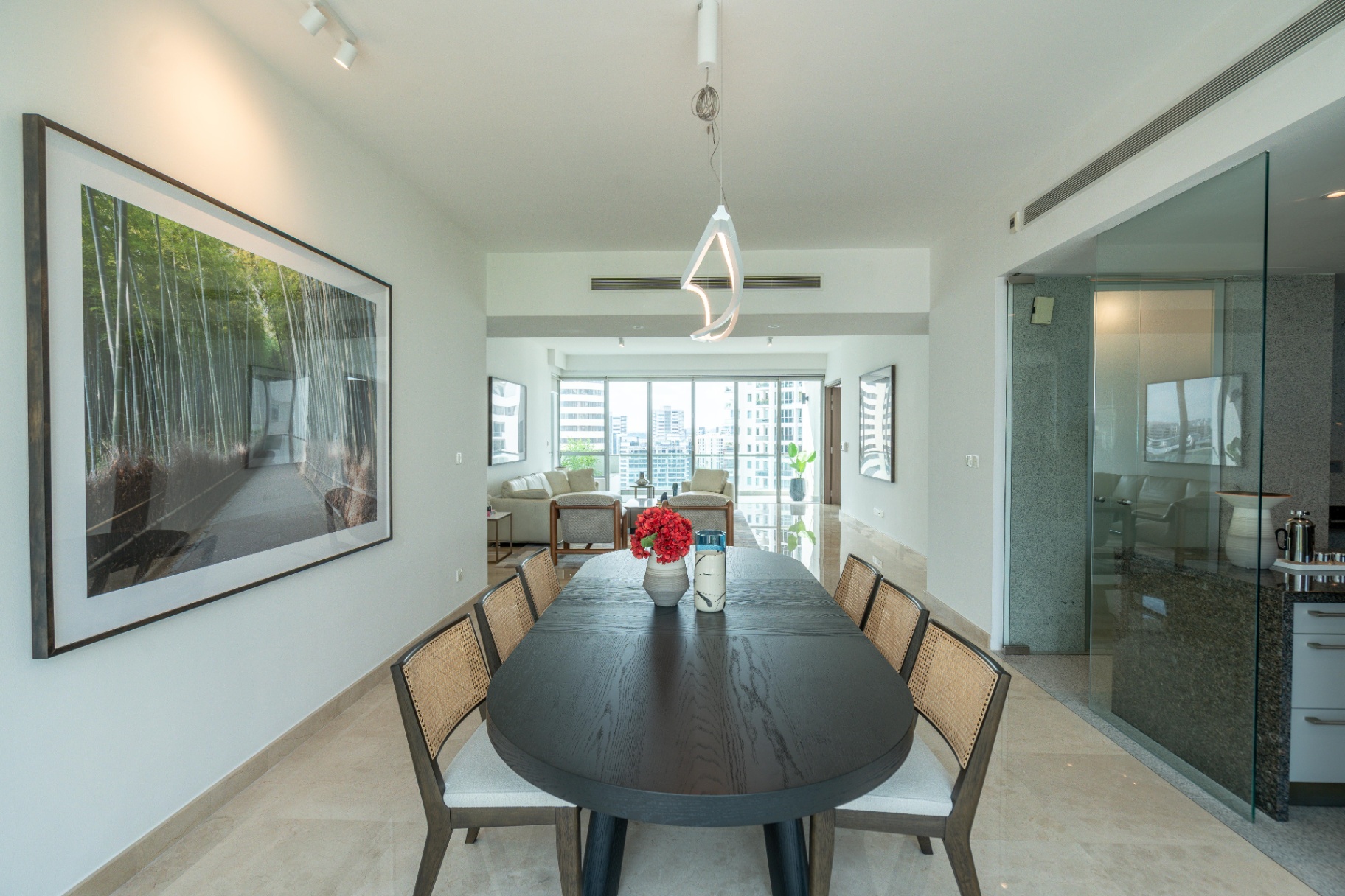 Draycott 8 — formal dining opening into living room with marble floors