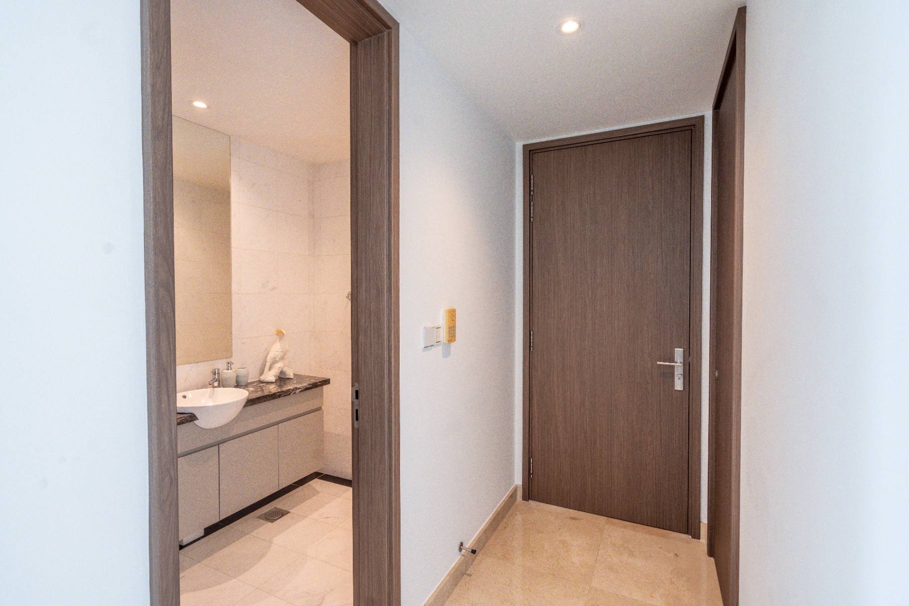 Draycott 8 — private hallway leading to guest powder room
