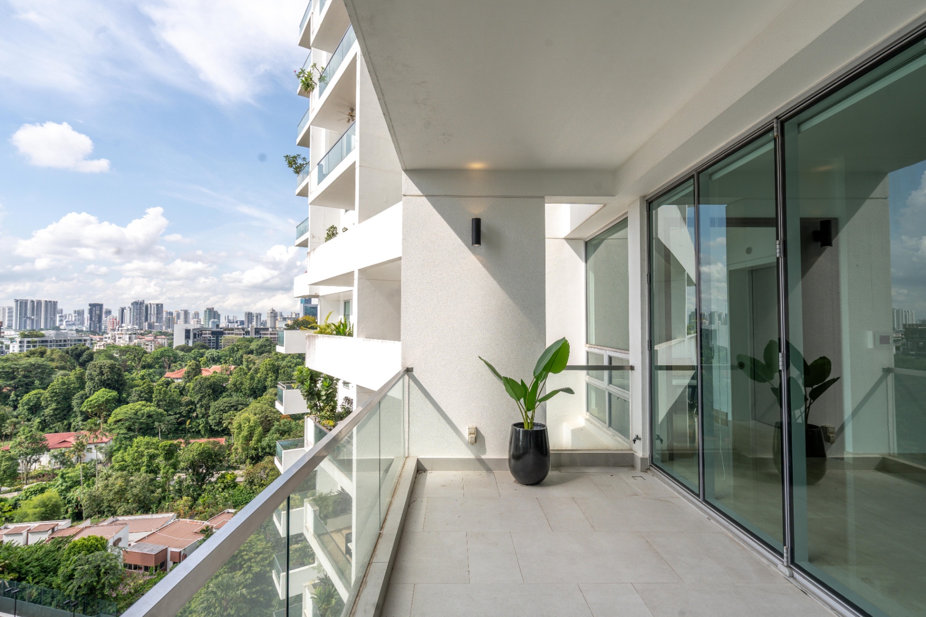 Draycott 8 — balcony with lush greenery outlook over low-rise conservation homes